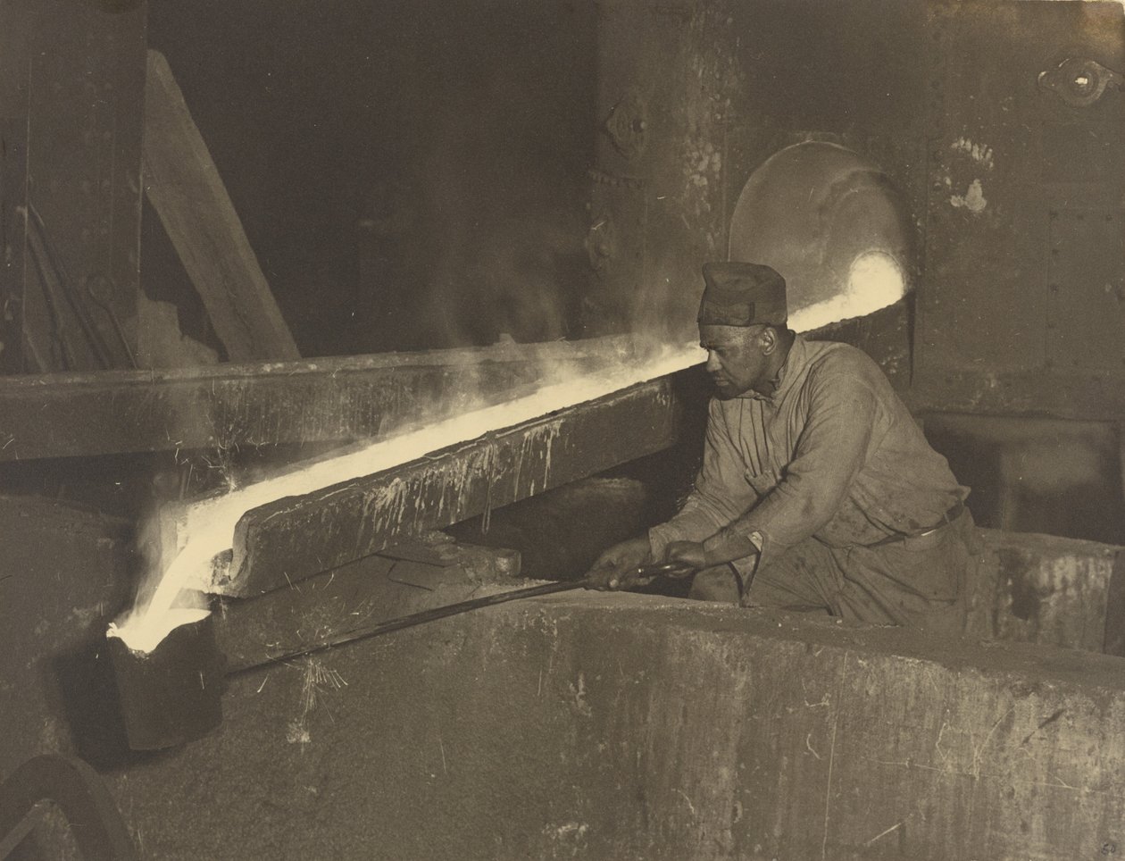 [Kovácssegéd, Baldwin mozdonygyár] alkotó: Lewis W. Hine
