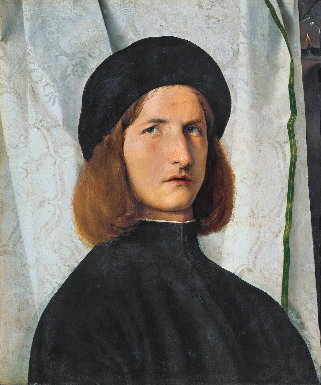 Fiatal férfi portréja lámpával, 1508 alkotó: Lorenzo Lotto