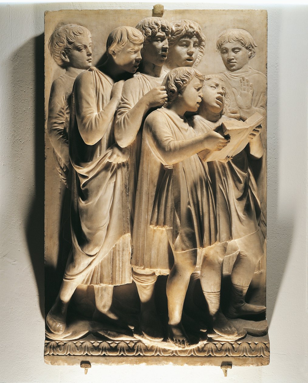 Dicsérjétek őt a kórusban (Salmo 150, Dicsérjétek az Urat), panel éneklő gyerekekkel alkotó: Luca Della Robbia