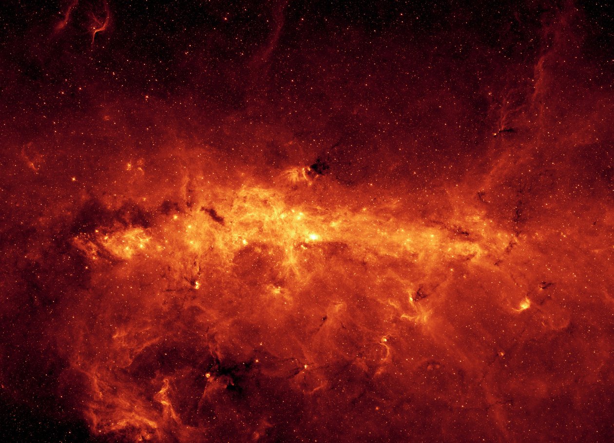 A Tejút-galaxis középpontja a Spitzer űrteleszkóppal nézve. Infravörös kép a galaktikus központról és a poros felhőkről, fiatal hatalmas csillagokkal megvilágítva. Köszönet a NASA-nak. Tudomány Csillagászati Űr alkotó: National Aeronautics and Space Administration National Aeronautics and Space Administration