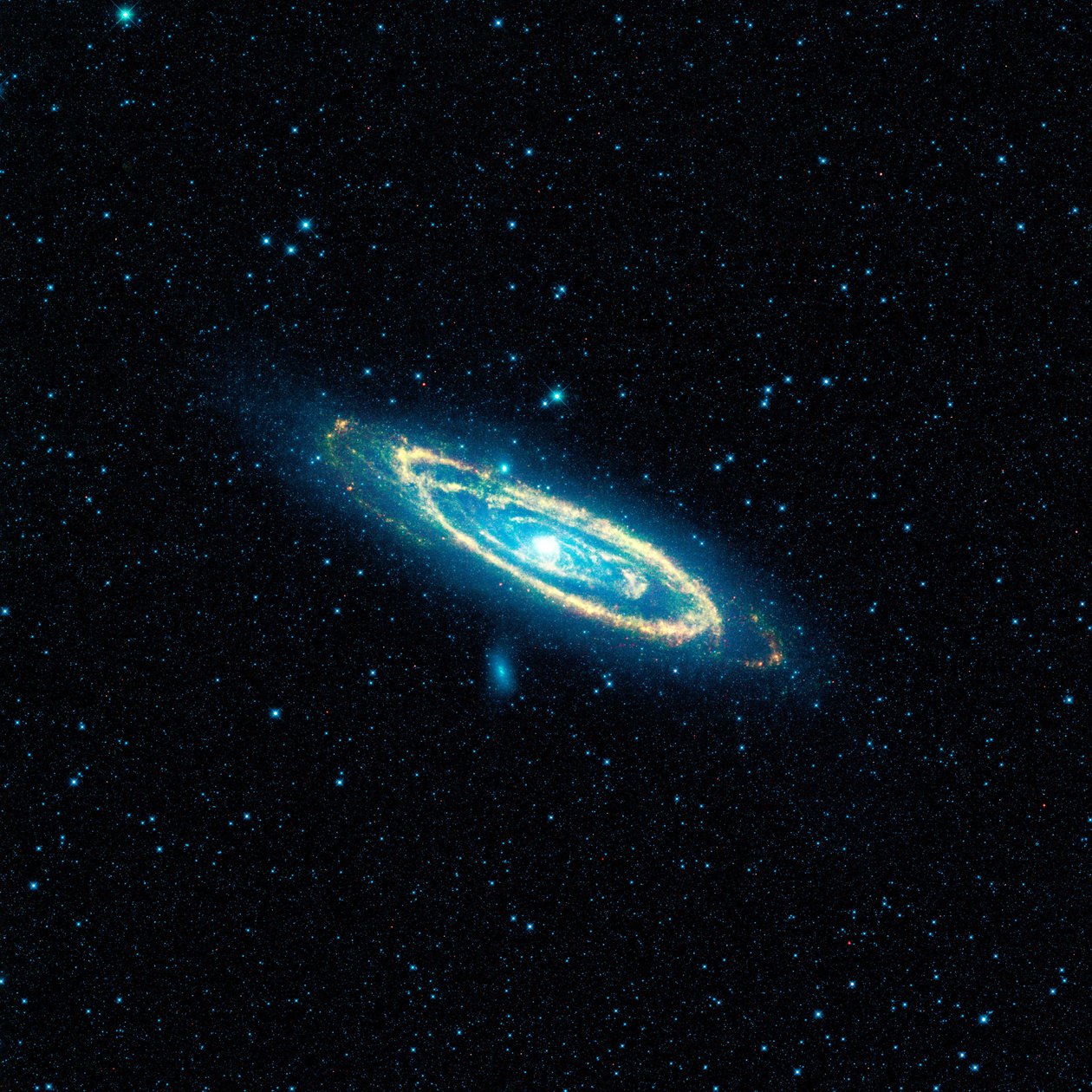 A NASA Wide-field Infrared Survey Explorer (WISE) által készített képe az Andromeda galaxisról, az M31-ről. A mozaik több mint 100 teliholdnak megfelelő területet fed le. Köszönet a NASA-nak. Tudomány Csillagászat alkotó: National Aeronautics and Space Administration National Aeronautics and Space Administration