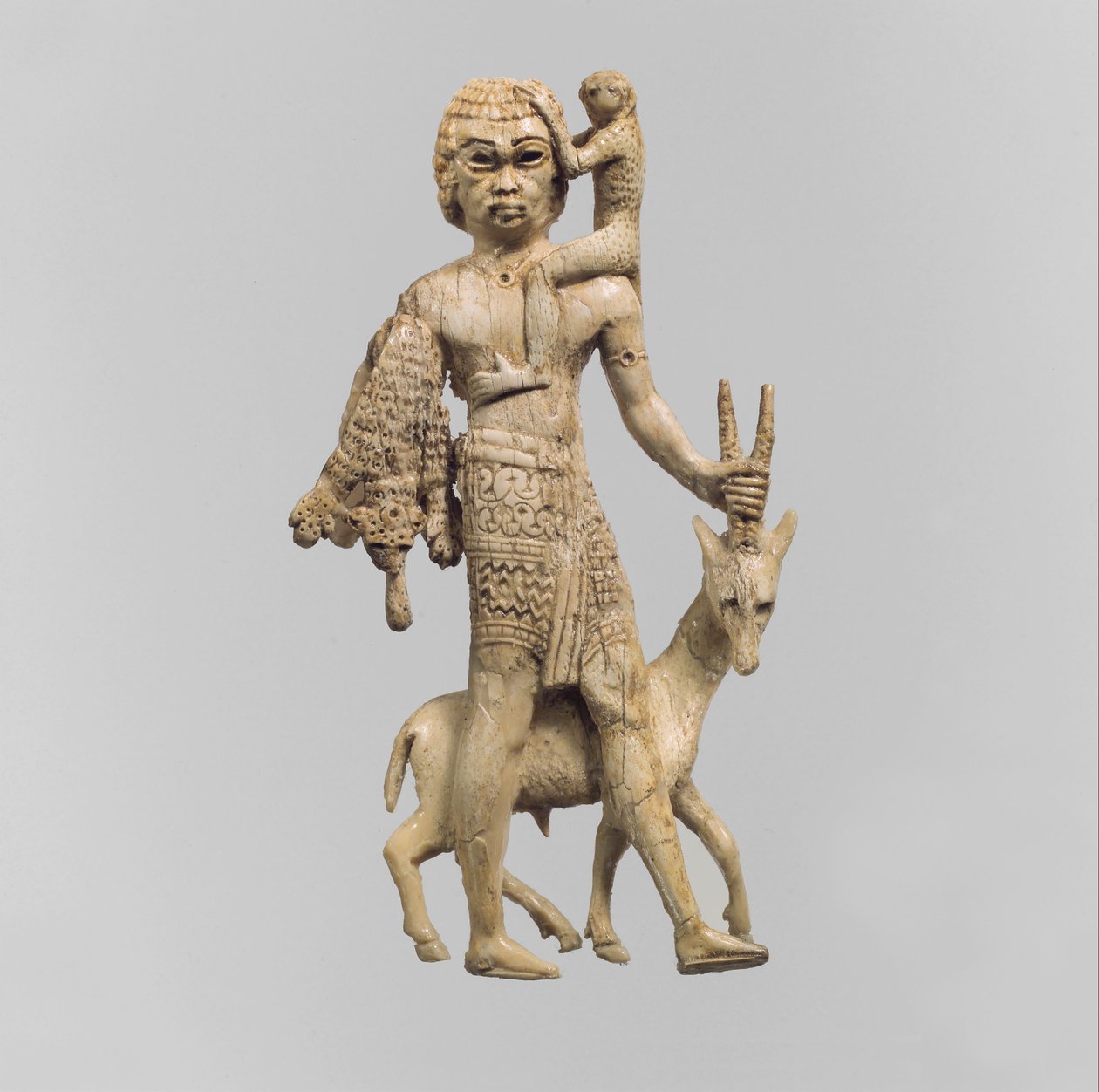 Orixos férfi szobra, majom és leopárdbőr, Kr.e. 8. század alkotó: Neo Assyrian Neo Assyrian