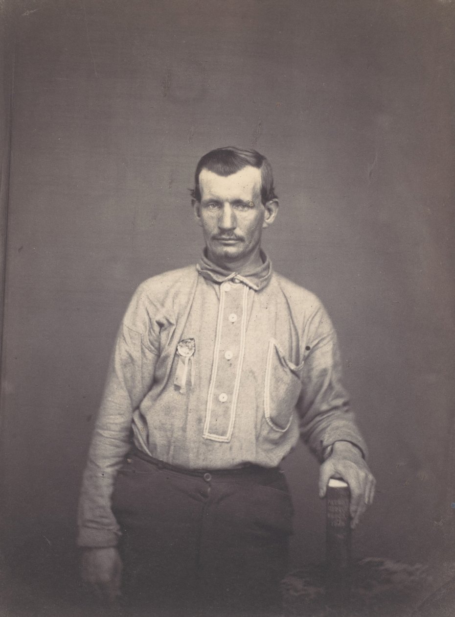 Férfi, aki szabadalmi hivatali könyvet tart, kb. 1857. alkotó: Oliver H. Willard.