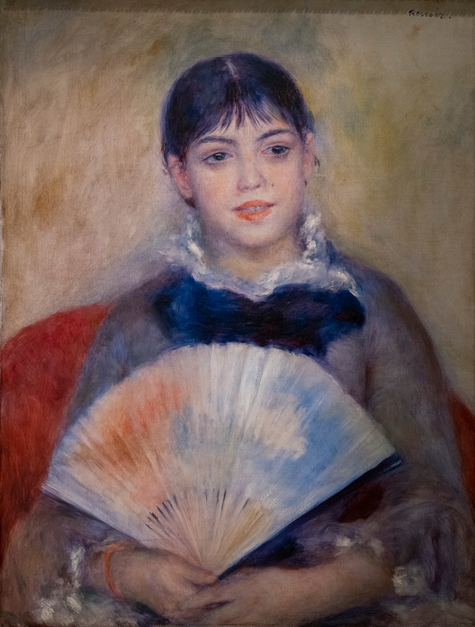Fiatal nő egy rajongó alkotó: Pierre Auguste Renoir