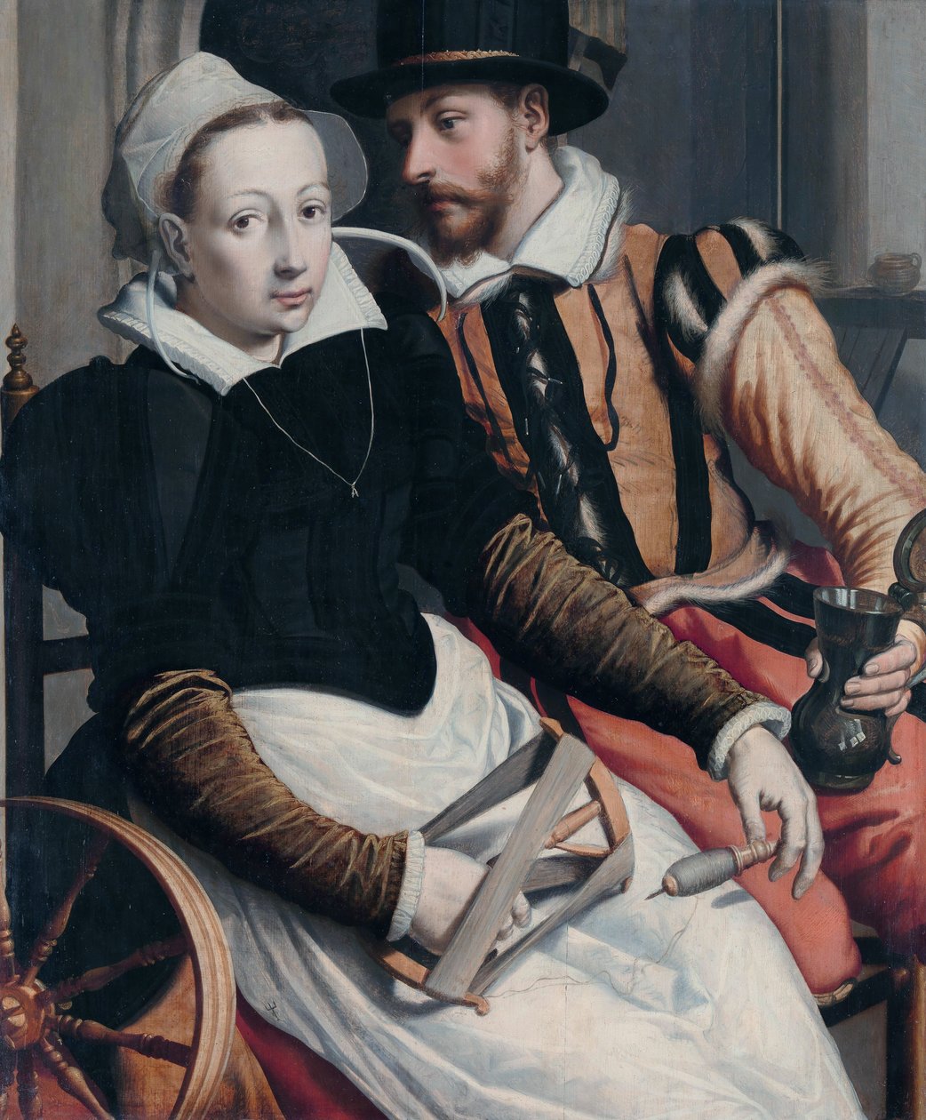 Egy nő a fonó keréknél és egy férfi bögrével a belső térben. alkotó: Pieter Pietersz the Elder
