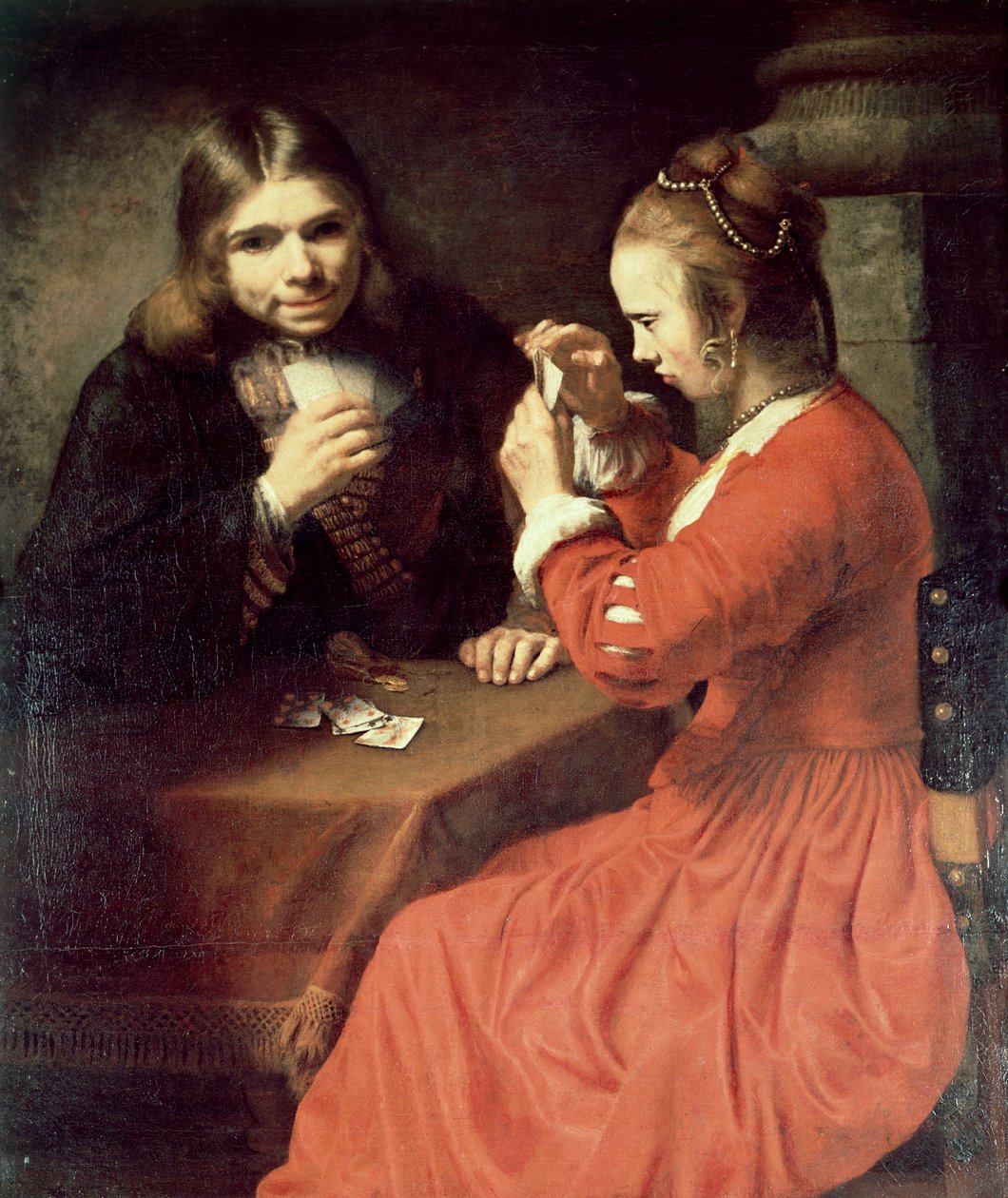 Egy fiatal férfi és egy lány kártyázik alkotó: Rembrandt van Rijn