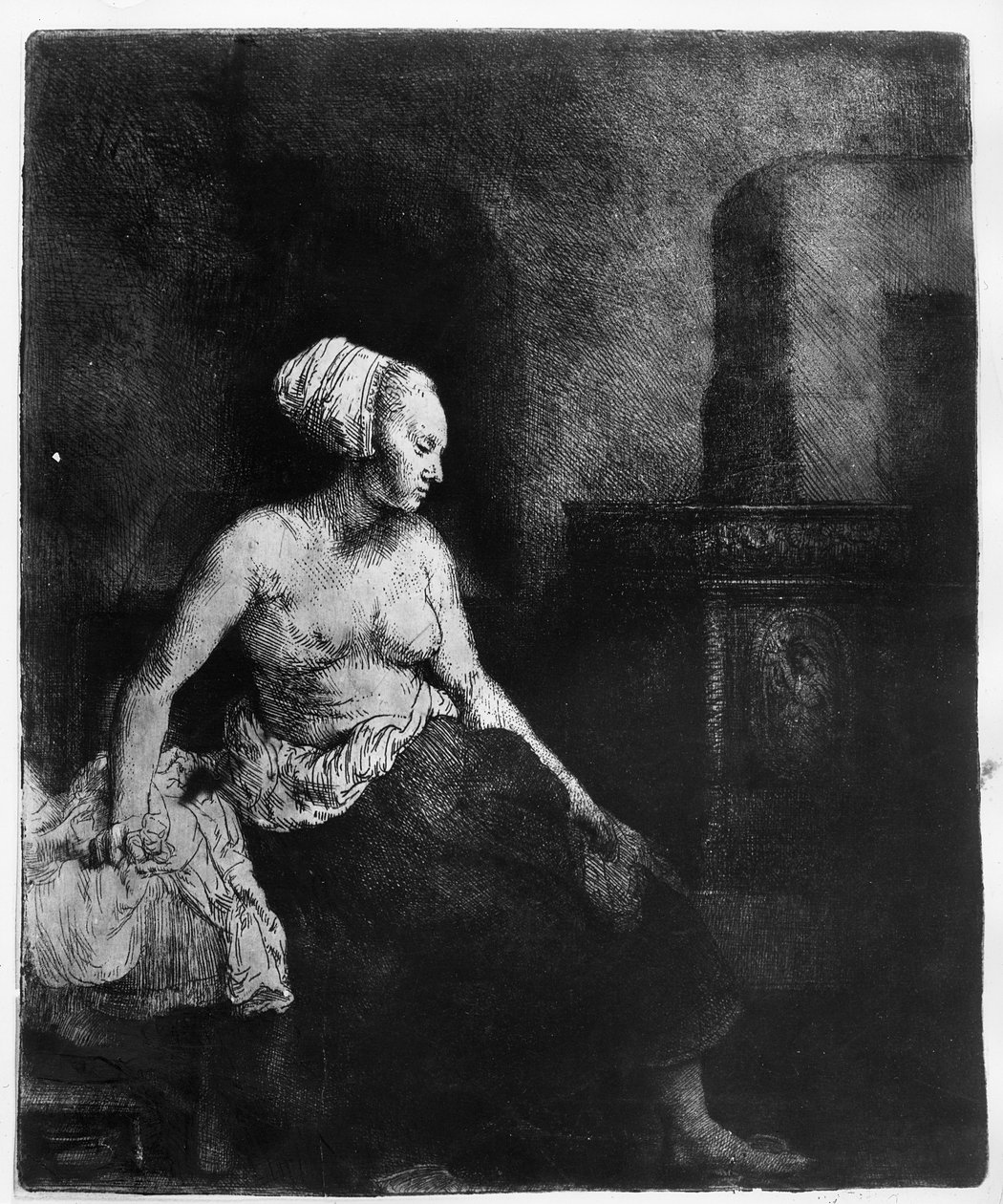 Nő félig felöltözve ül a tűzhely mellett, 1658 alkotó: Rembrandt van Rijn