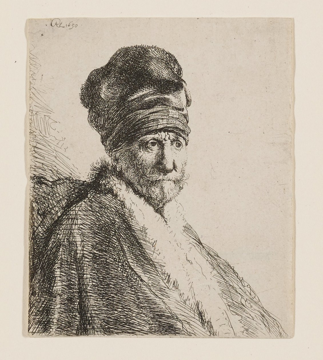 Magas sapkát viselő férfi mellszobra alkotó: Rembrandt van Rijn