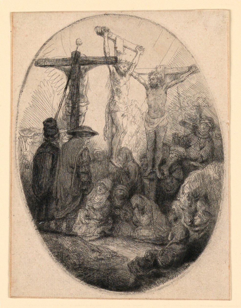 Krisztus keresztre feszítve a két tolvaj között: egy ovális tányér alkotó: Rembrandt van Rijn