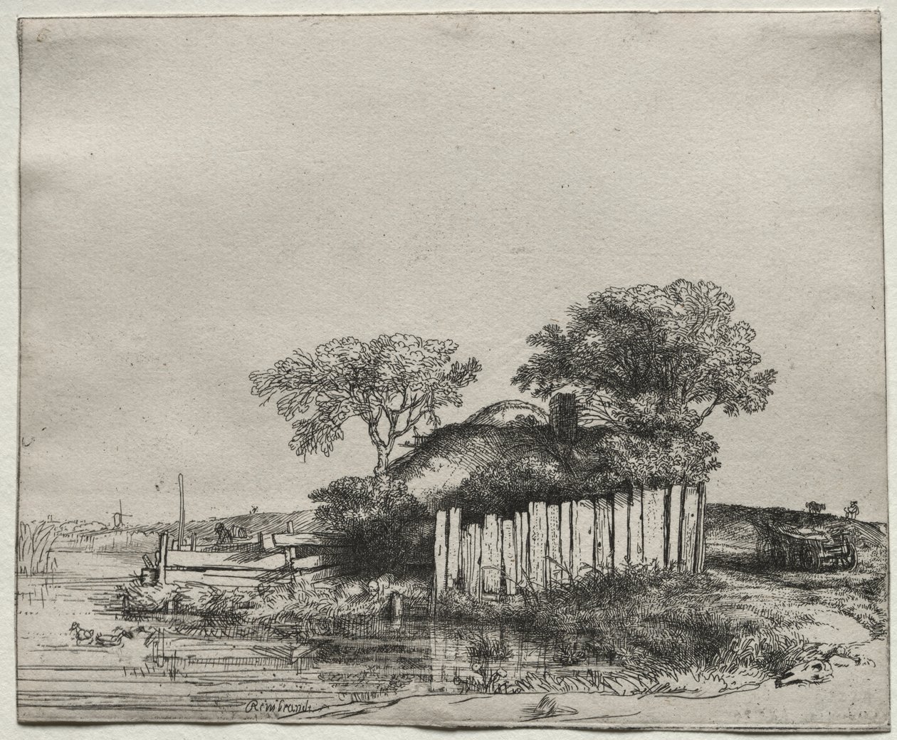 Házikó fehér palánkkal alkotó: Rembrandt van Rijn