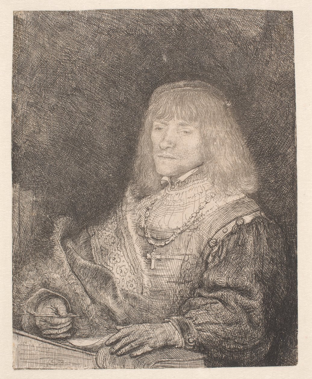 Egy férfi az íróasztalnál, keresztet és láncot visel alkotó: Rembrandt van Rijn