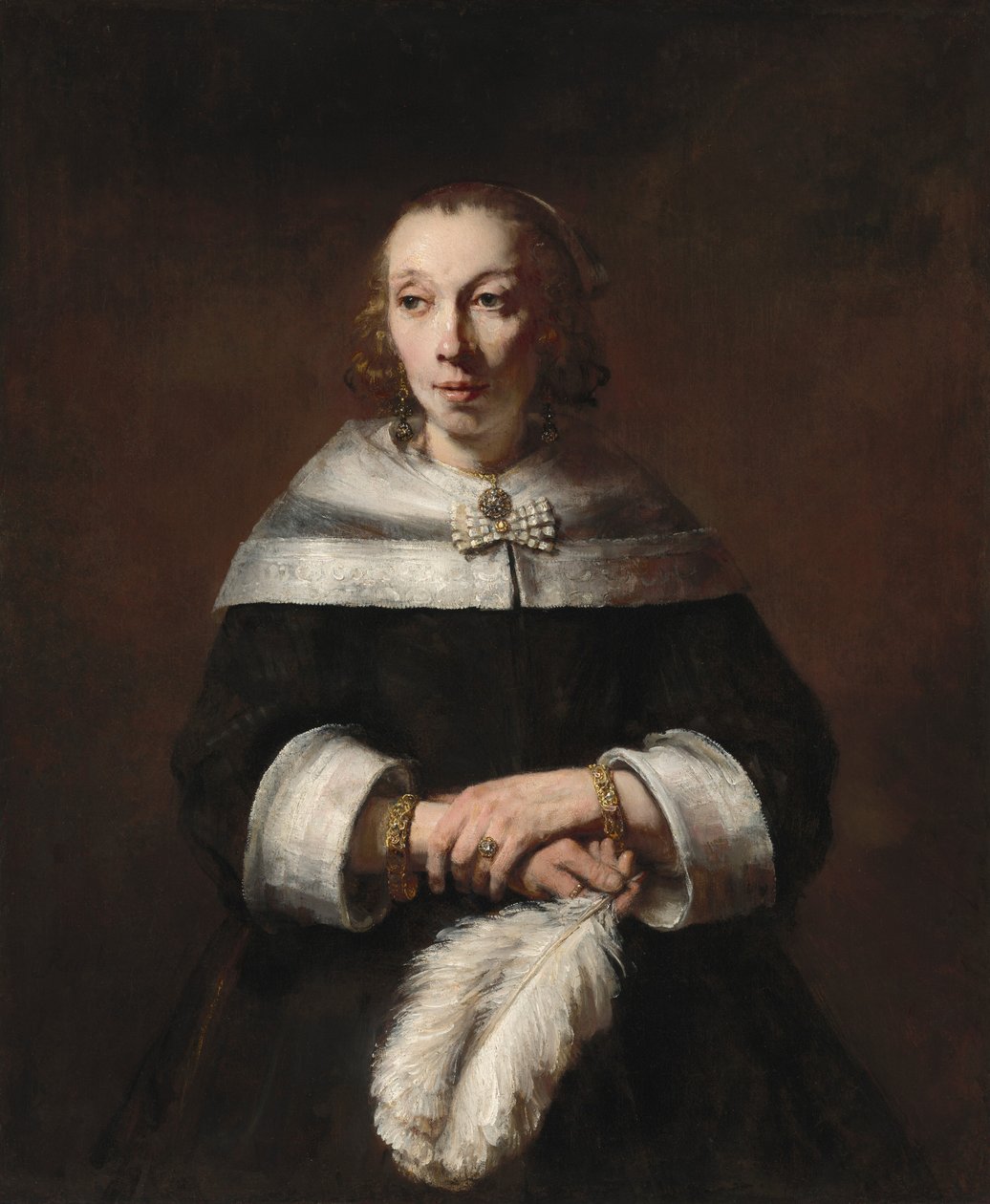 Strucctoll legyezős hölgy portréja alkotó: Rembrandt van Rijn