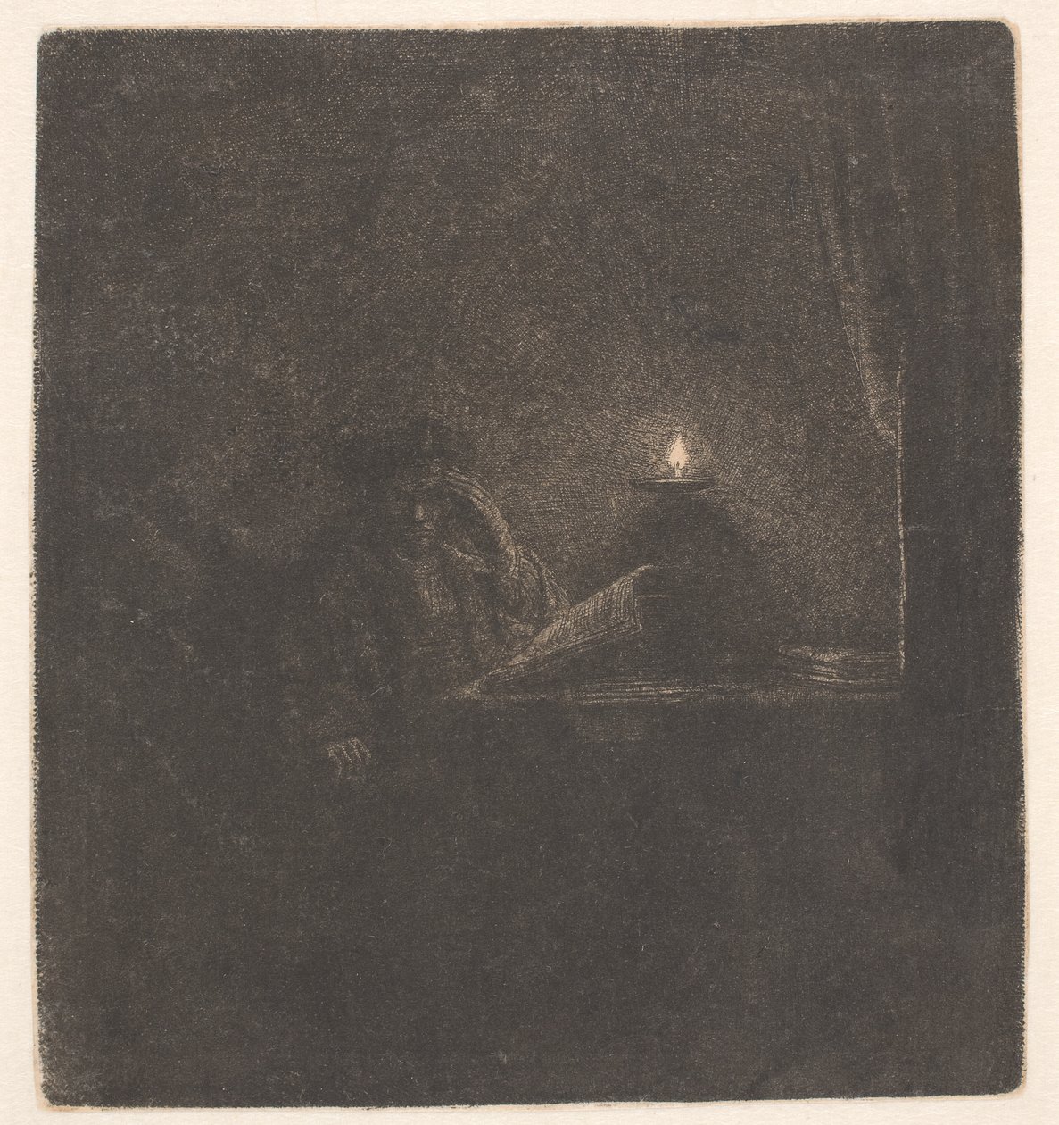 Egy diák egy asztalnál gyertyafénynél alkotó: Rembrandt van Rijn