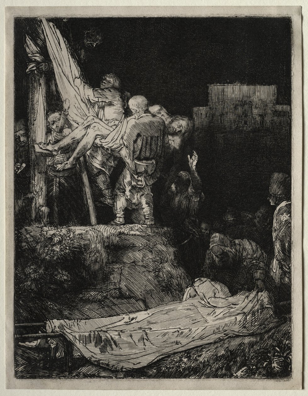 A keresztről való leszállás fáklyafénynél alkotó: Rembrandt van Rijn