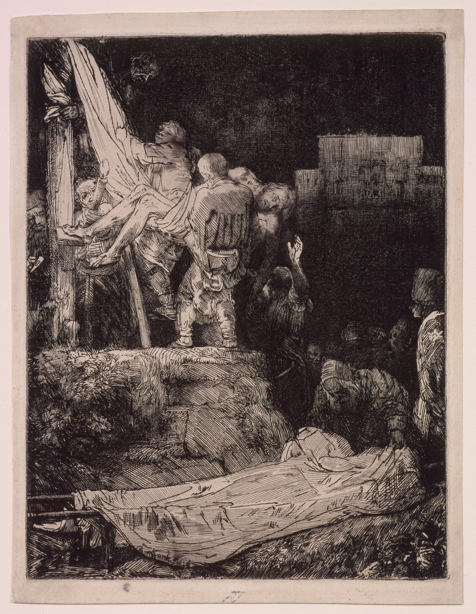 A keresztről való levétel fáklyafényben alkotó: Rembrandt van Rijn