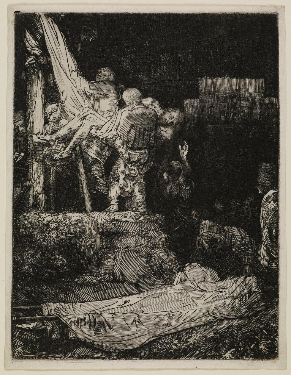 A keresztről való levétel fáklyafényben alkotó: Rembrandt van Rijn
