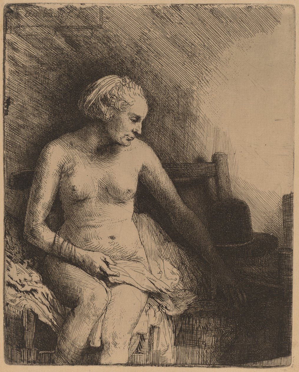 Nő a fürdőben kalappal mellette alkotó: Rembrandt van Rijn
