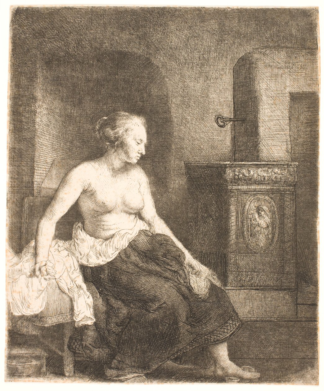 Nő félig felöltözve ül a tűzhely mellett alkotó: Rembrandt van Rijn