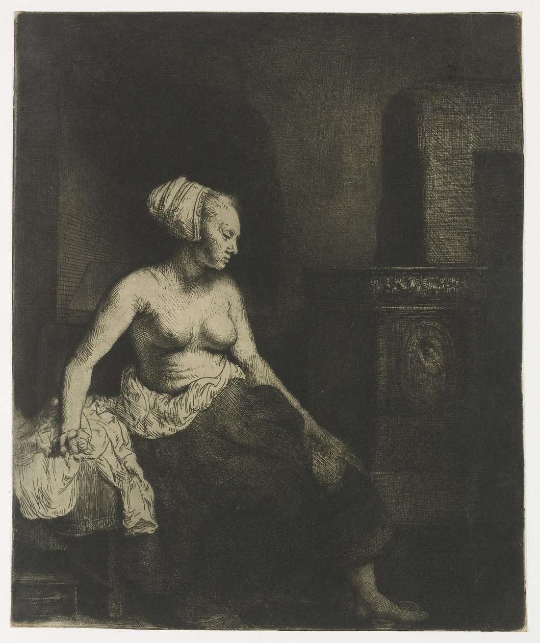 Nő félig felöltözve ül a tűzhely mellett alkotó: Rembrandt van Rijn
