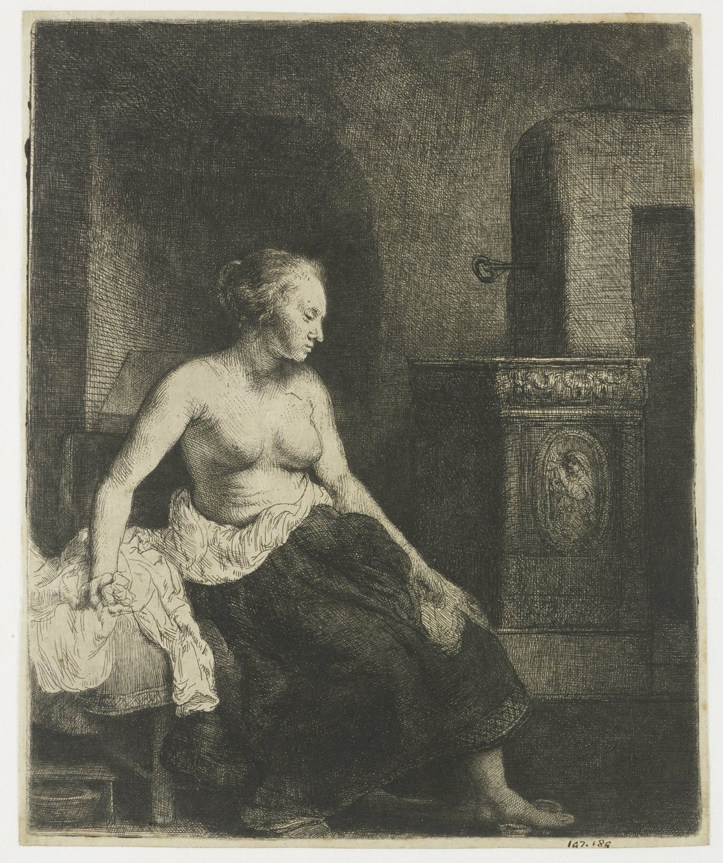 Nő félig felöltözve ül a tűzhely mellett alkotó: Rembrandt van Rijn