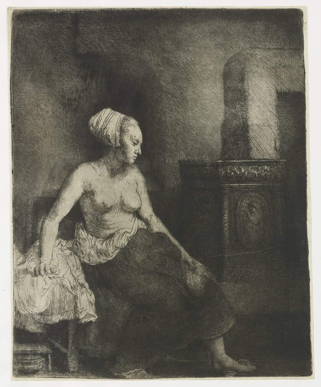 Nő félig felöltözve ül a tűzhely mellett alkotó: Rembrandt van Rijn