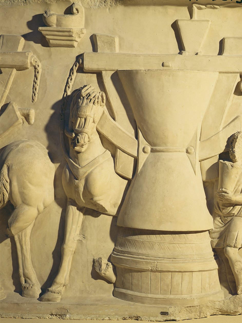 Egy őrlési jelenetet ábrázoló dombormű alkotó: Roman