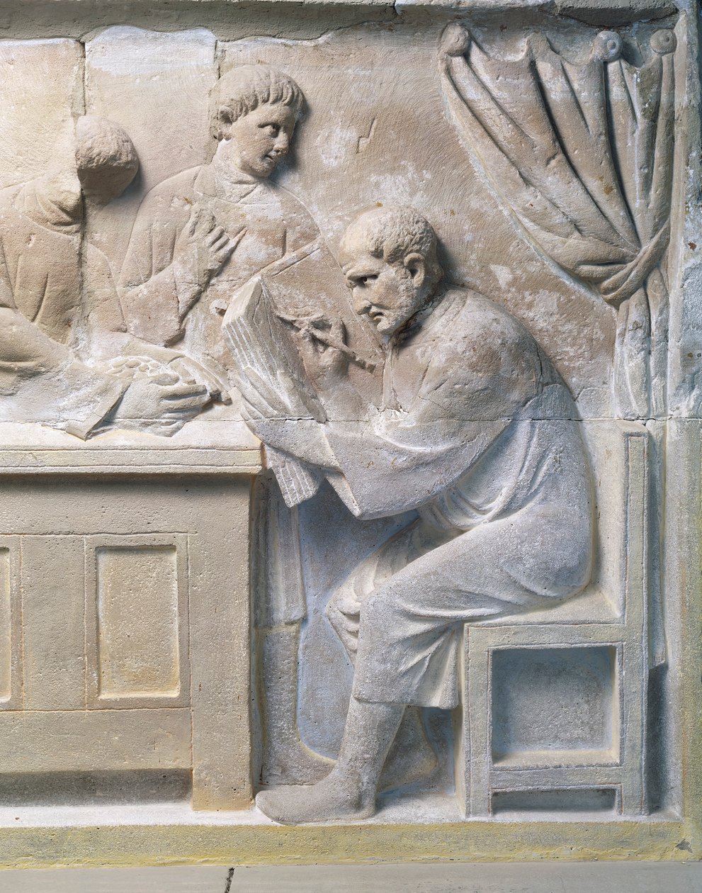 Adószedőt ábrázoló dombormű a mauzóleumból alkotó: Roman