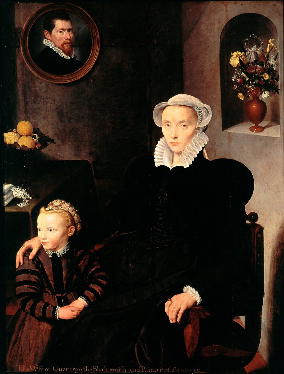 Az antwerpeni kovács és festő feleségének portréja, Quenston gyermekével Az anya feketébe öltözött, gallért és fejdíszt visel. Az antwerpeni iskola festménye. 1576 Dim. 136x108 cm Párizs, Musee du Louvre alkotó: School Antwerp