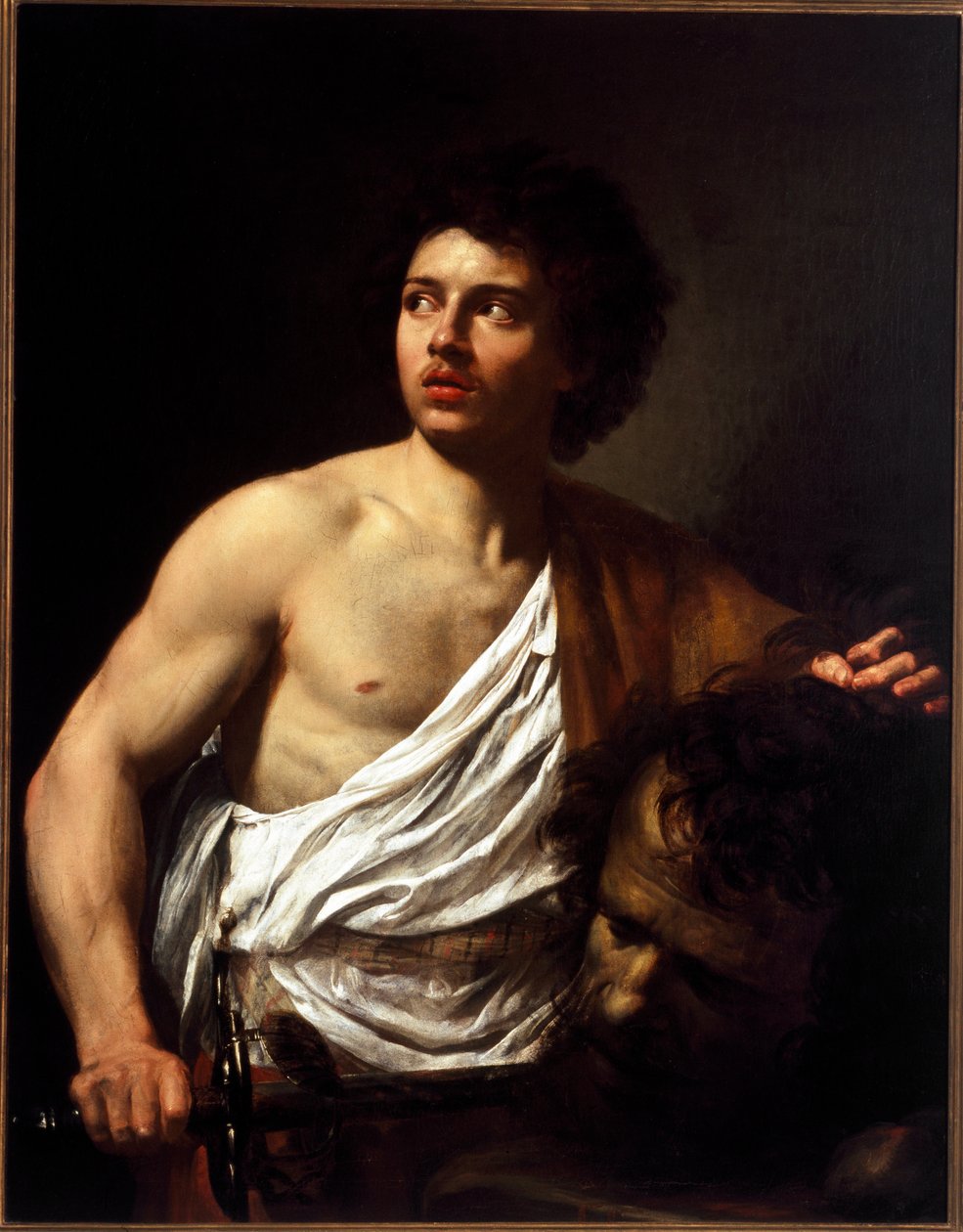 Dávid tartja Simon Vouet (1590-1649) Góliát-festményének fejét alkotó: Simon Vouet
