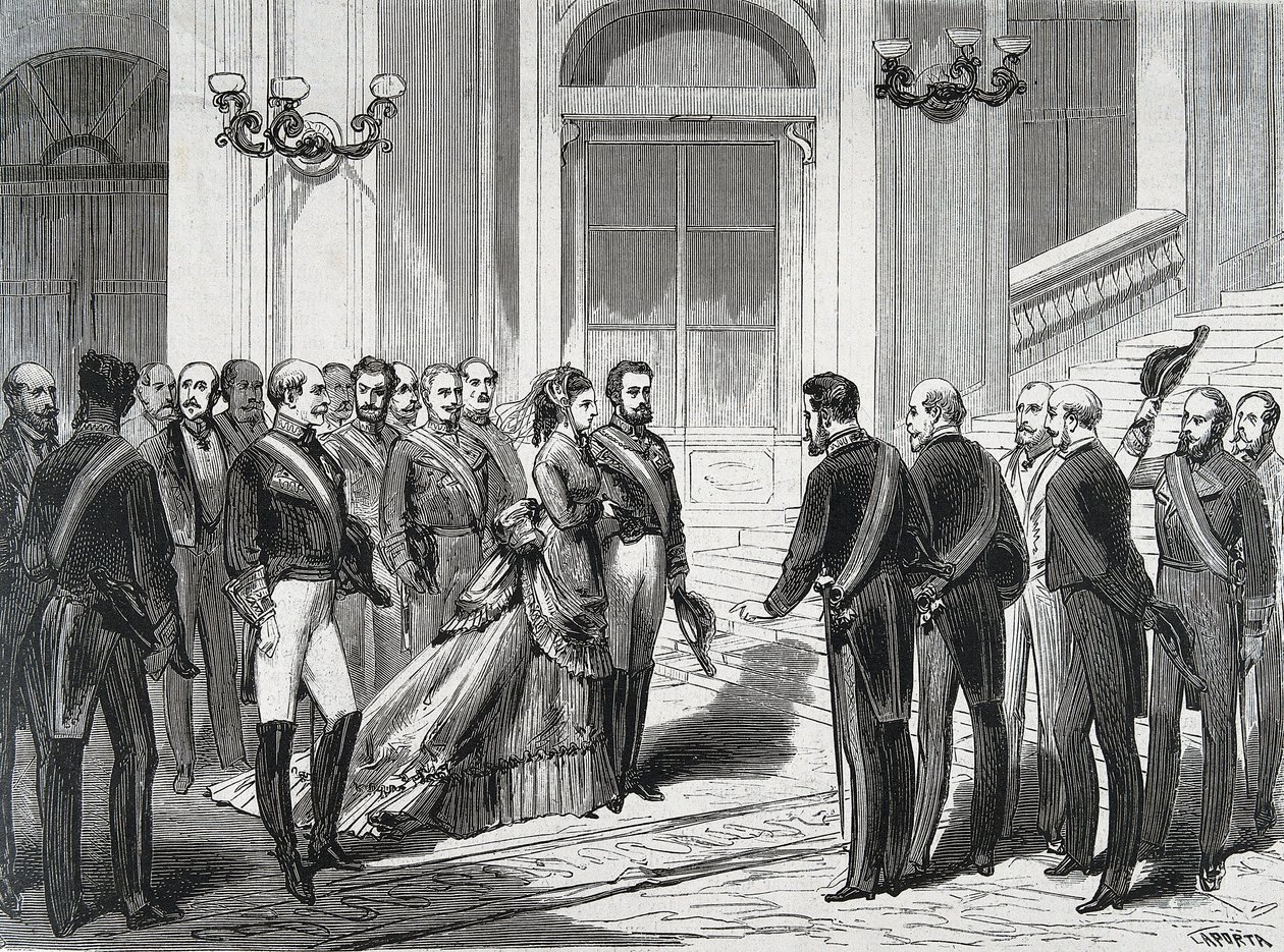 A spanyol király I. Amedeus (Amedeo Ferdinando Maria di Savoia) (1845-1890) és felesége, Mária Victory dal Pozzo della Cisterna (1847-1876) a madridi királyi palotába érkezésükkor 1871. március 19-én. Metszet a "" La Ilustracion Espanola y America-ból alkotó: Spanish School