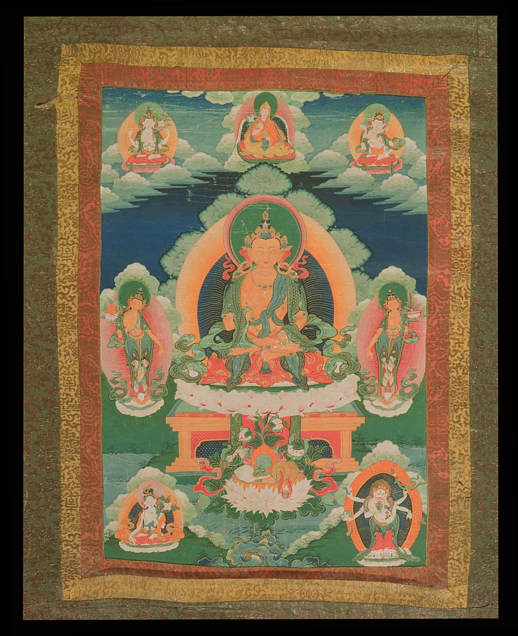 Thangka festmény, amely egy azonosítatlan bodhiszattvát ábrázol, körülöttük különböző bodhiszattvákkal, istenségekkel és szent emberekkel, Lhászából, 1780-1880 (selyemre festett papír) alkotó: Tibetan School