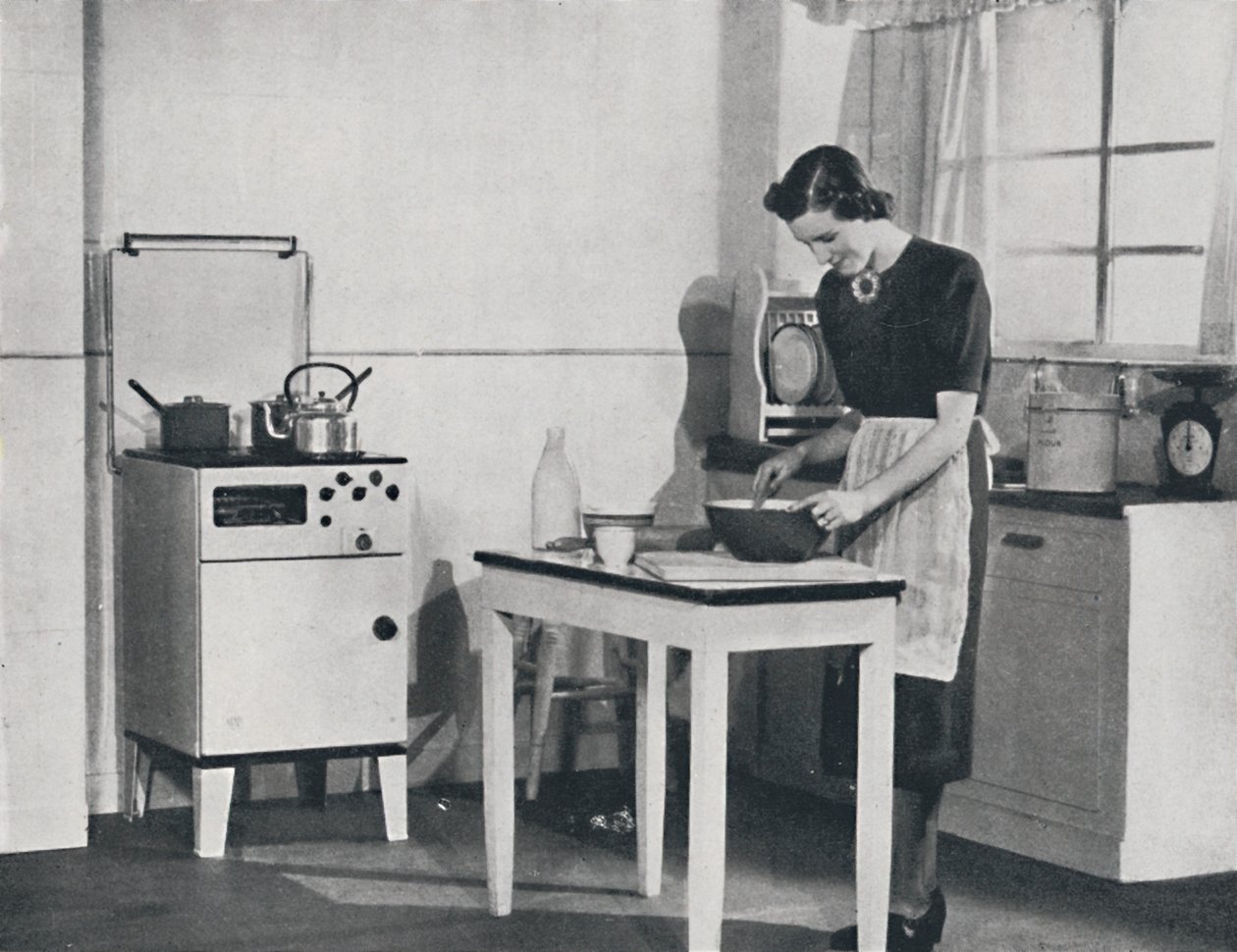Szekrényes gáztűzhellyel felszerelt brit konyha, 1942. alkotó: Unbekannt