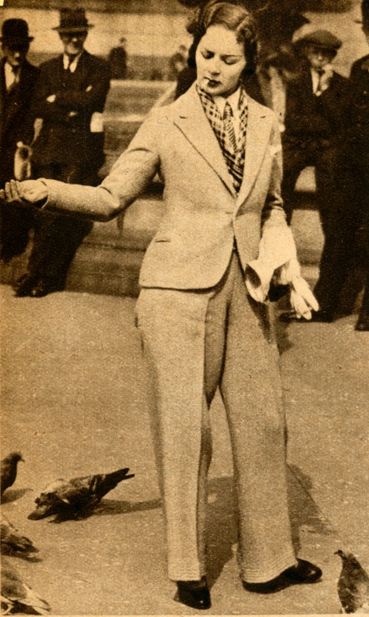 Egy eljegyzett hölgy galambokat etet a Trafalgar Square-en, 1933. alkotó: Unbekannt