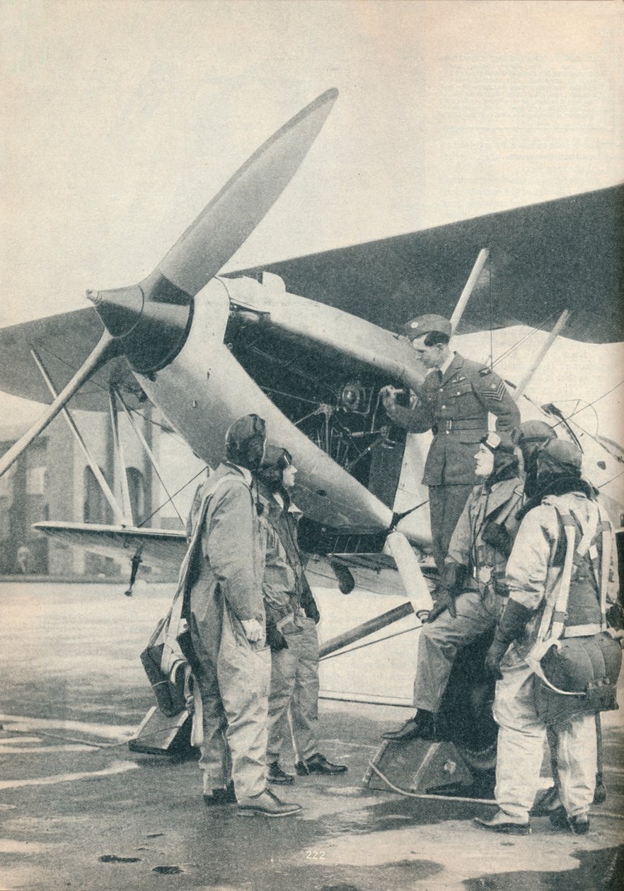 Egy oktató, aki elmagyarázza a motor részleteit a tanulóknak a Sealand Aerodrome-on, Flintshire, c1936 c1937 alkotó: Unbekannt