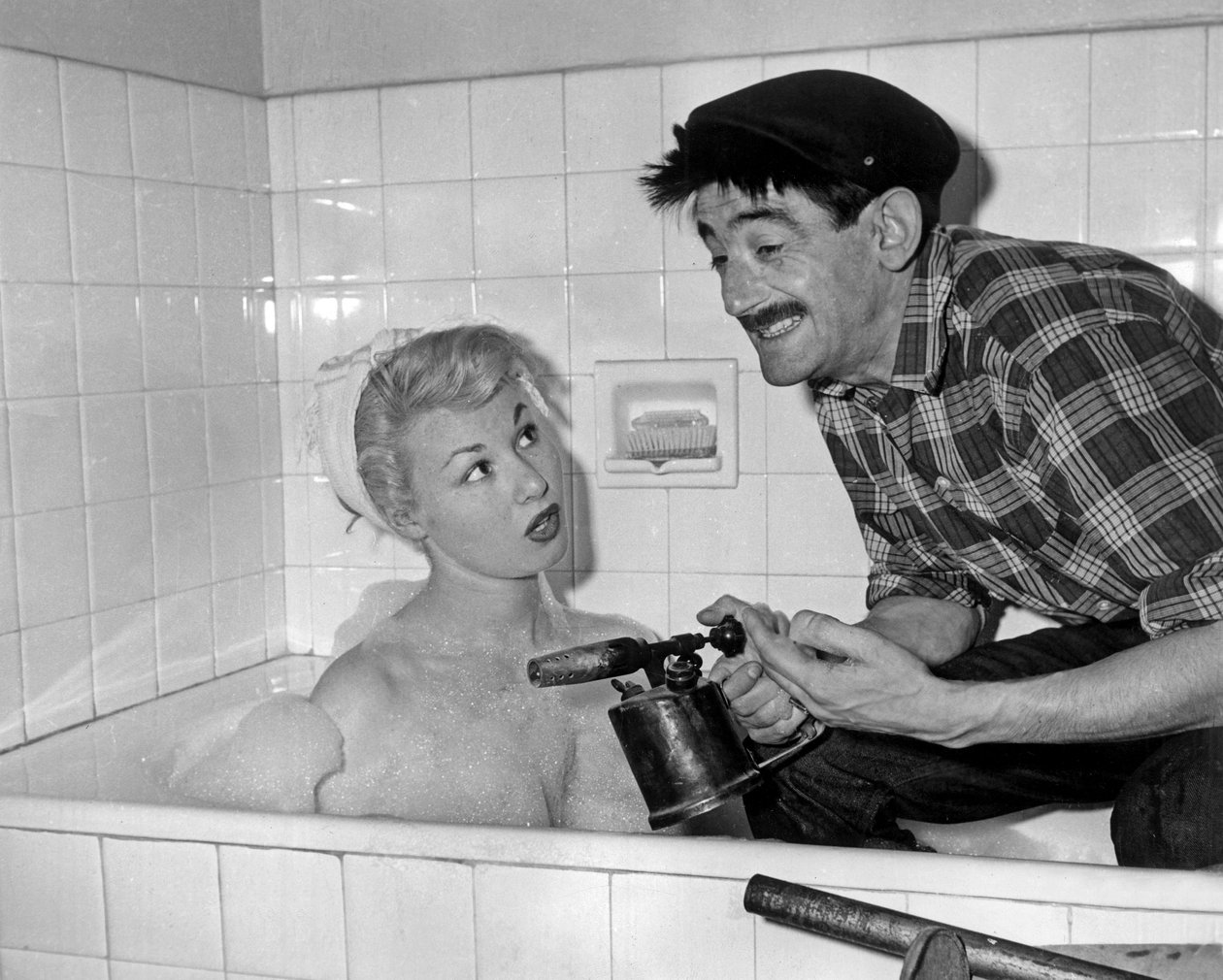 Nadine Tallier (jelenleg Nadine De Rothschild bárónő) és Maurice Gardett az otthoni estén Párizsban, 1961. március 27-én alkotó: Unbekannt Unbekannt