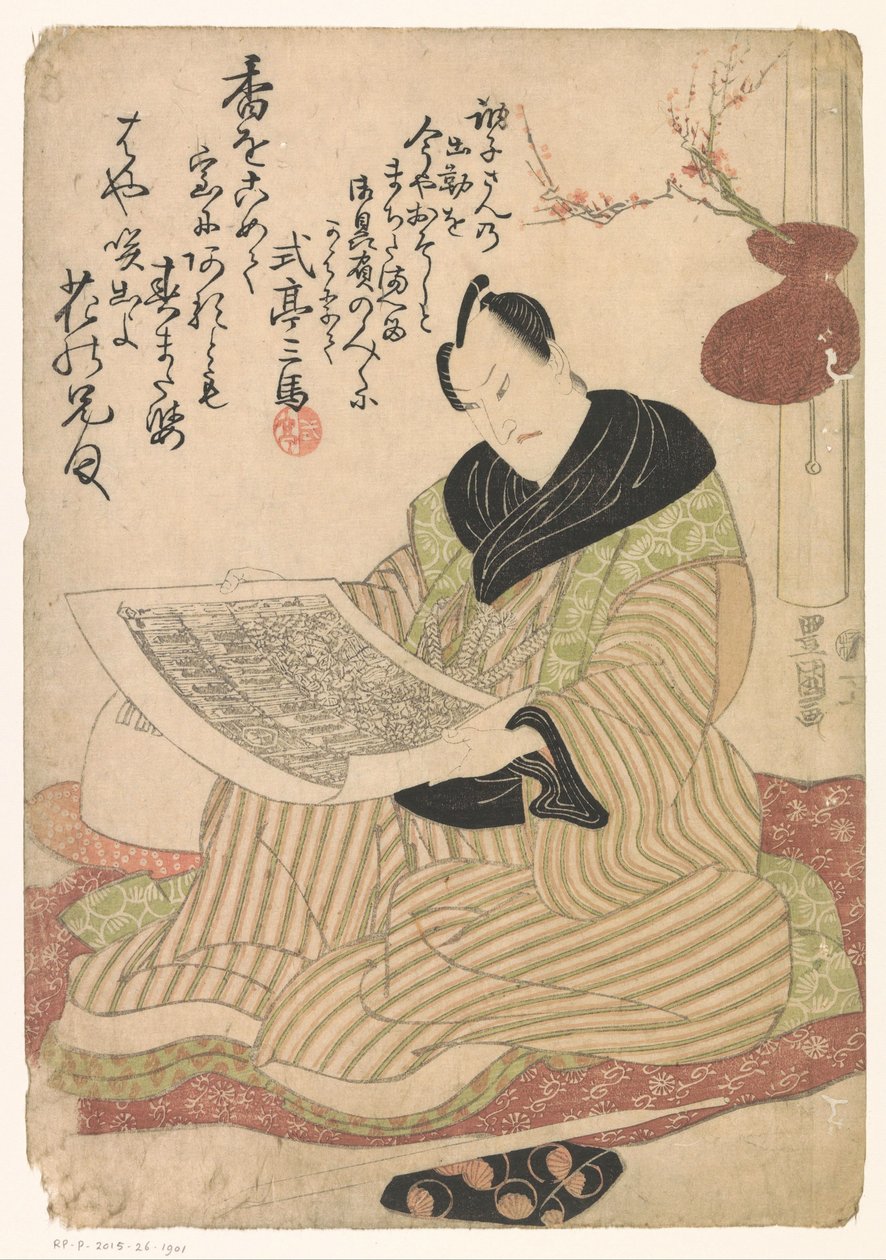 Férfi egy képpel a kezében alkotó: Utagawa Toyokuni (I)