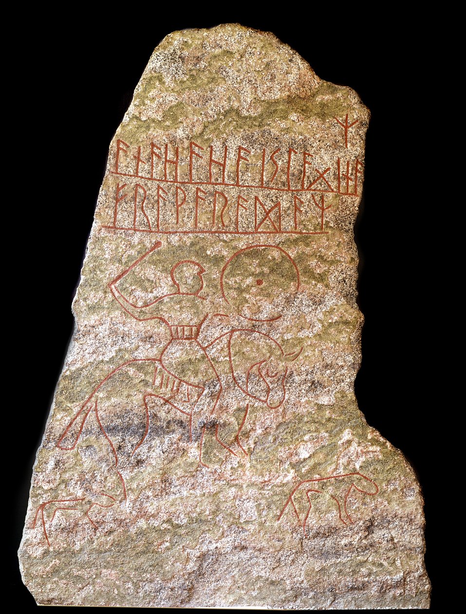 Rúnaírásos sztélé, amely egy viking lovast ábrázol kutyával (kővel) alkotó: Viking Viking