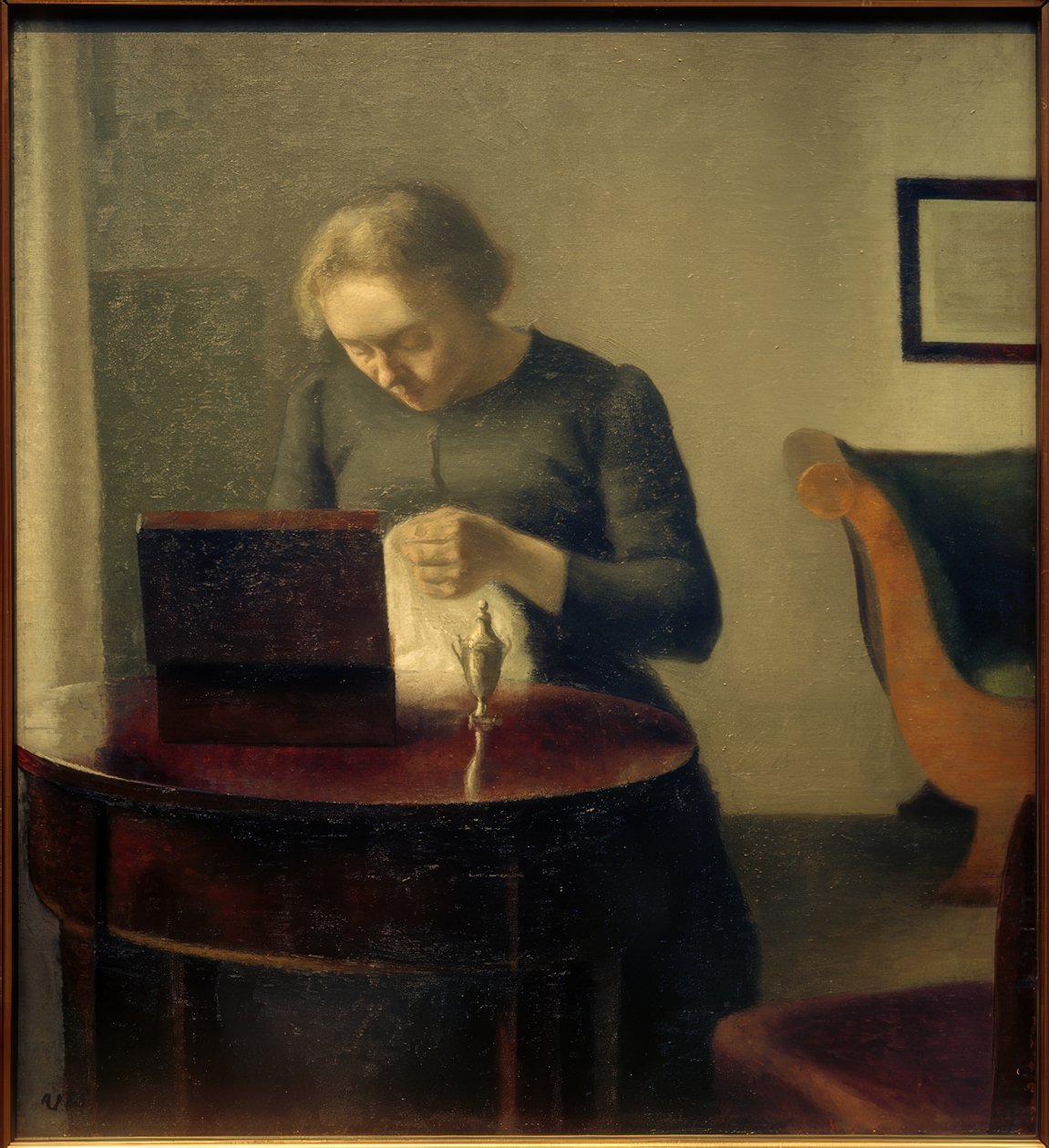 A művész felesége a varróasztalnál alkotó: Vilhelm Hammershoi