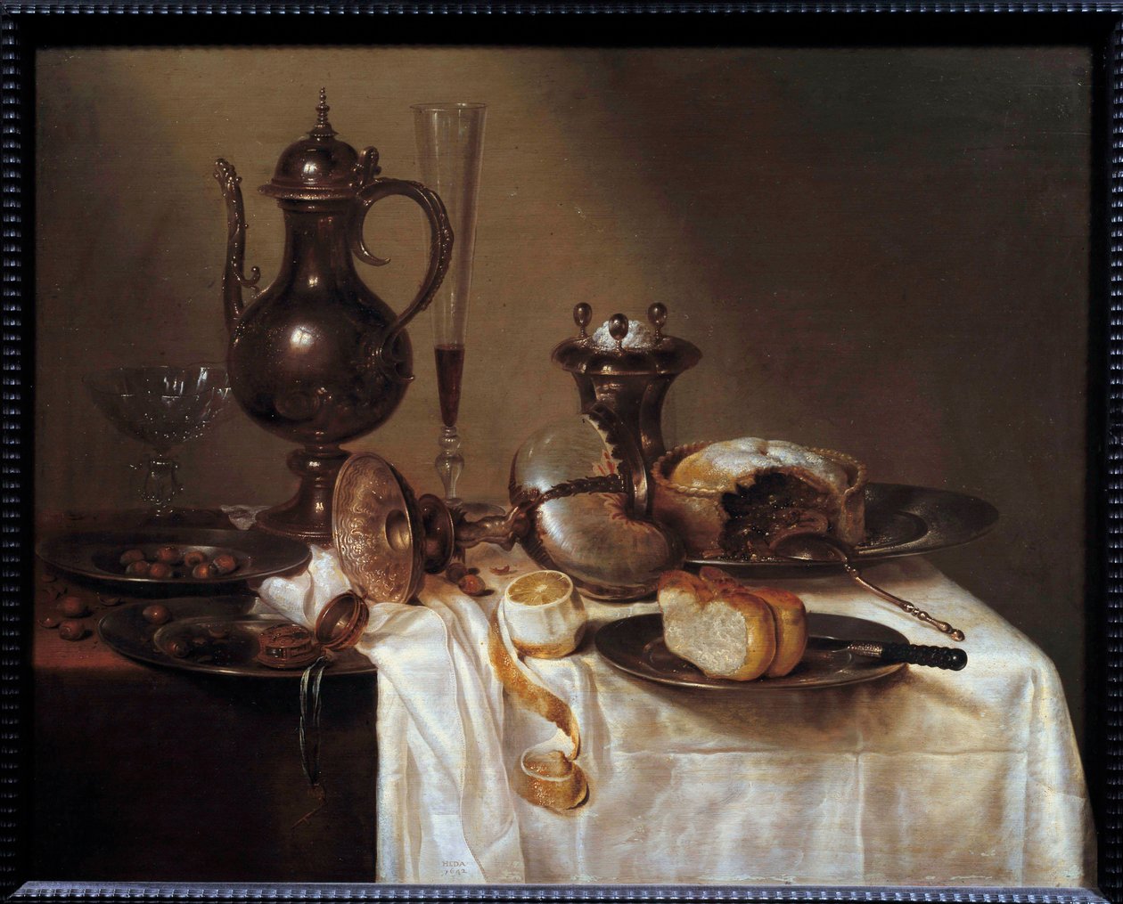 Csendélet a hajózásnál. Ezüst edényekkel, kenyérrel, borfuvolával, lepénnyel és hámozott citrommal borított asztal. Willem Heda (1594-1670) festménye 1642 Saint Etienne, Szépművészeti Múzeum alkotó: Willem Claesz. Heda