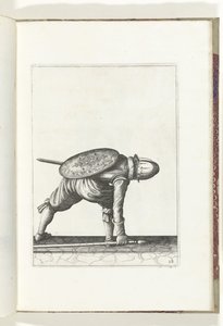 A pajzs és tüske gyakorlat: A katona lehajol, hogy felvegye a tüskét (28.), 1618 A Nassausche Wapen-Handelinge, van Schilt, Kémek, Rappier és a célpont: beyde figuerlick ábrázolva, és az új rend szerint bekeretezve [a] (...) Maurits van Nassau (t alkotó: Adam van Breen