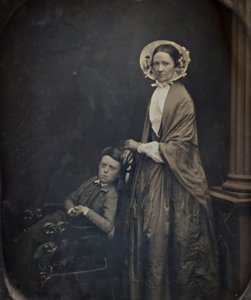 Untitled: A Woman in Bonnet and Shawl, with her Seating Son, c. 1850. Alkotók: Albert Sands Southworth, Josiah Johnson Hawes. alkotó: Albert Sands Southworth, Josiah Johnson Hawes