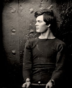 Lewis Powell csuklóvasalóban a USS Saugus fedélzetén, 1865 alkotó: Alexander Gardner