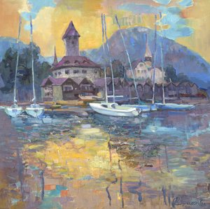 Vitorlások a tó tükrében