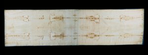 A torinói szent lepel (vagy lepel vagy sacra sindone), vászonlepedő, amelyen testkínzás nyomai láthatók (állítólag Krisztuséi). A torinói Keresztelő Szent János katedrális királyi kápolnája, Olaszország. - A torinói szent lepel (sacra sindone), régi sor