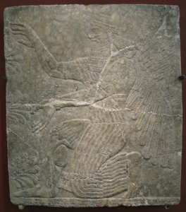 Szárnyas istenség a szent fa mellett. Dombormű II. Assurnasirpal palotájából Kalhuban, Nimrudban, ie 9. század alkotó: Assyrian