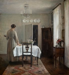A művész felesége asztalt terít