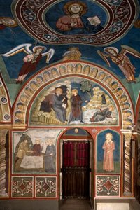 Saint Benoit életének különböző epizódjai: a központban „Szent Placide csodája” Nursie-i Szent Benoit első tanítványa, Szent Maur beavatkozásának köszönhetően megmenti a fiatal Placide-ot, aki egy tó patakjába került. Lent a csoda alkotó: Consolo