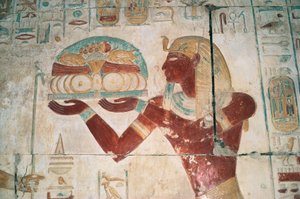 Egyiptom, Abüdosz, I. Szeti fáraó temploma, Ozirisz-kápolna, festett dombormű, áldozati hordozót ábrázolva alkotó: Egyptian 19th Dynasty