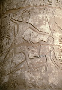 Ramszesz a hajuknál fogva tartja ázsiai ellenségeit, miközben készül megölni őket, dombormű, I. Szeti temploma, Kanaisz, Egyiptom, Egyiptomi civilizáció, Újbirodalom, XIX. dinasztia (fotó) alkotó: Egyptian 19th Dynasty