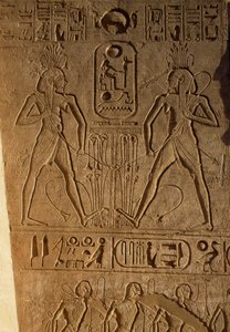 Felső- és Alsó-Egyiptom egyesülése és a fáraó kartuszja, dombormű a trónok alapján, II. Ramszesz temploma, Abu Simbel, Egyiptom, Újbirodalom, XIX. dinasztia alkotó: Egyptian 19th Dynasty